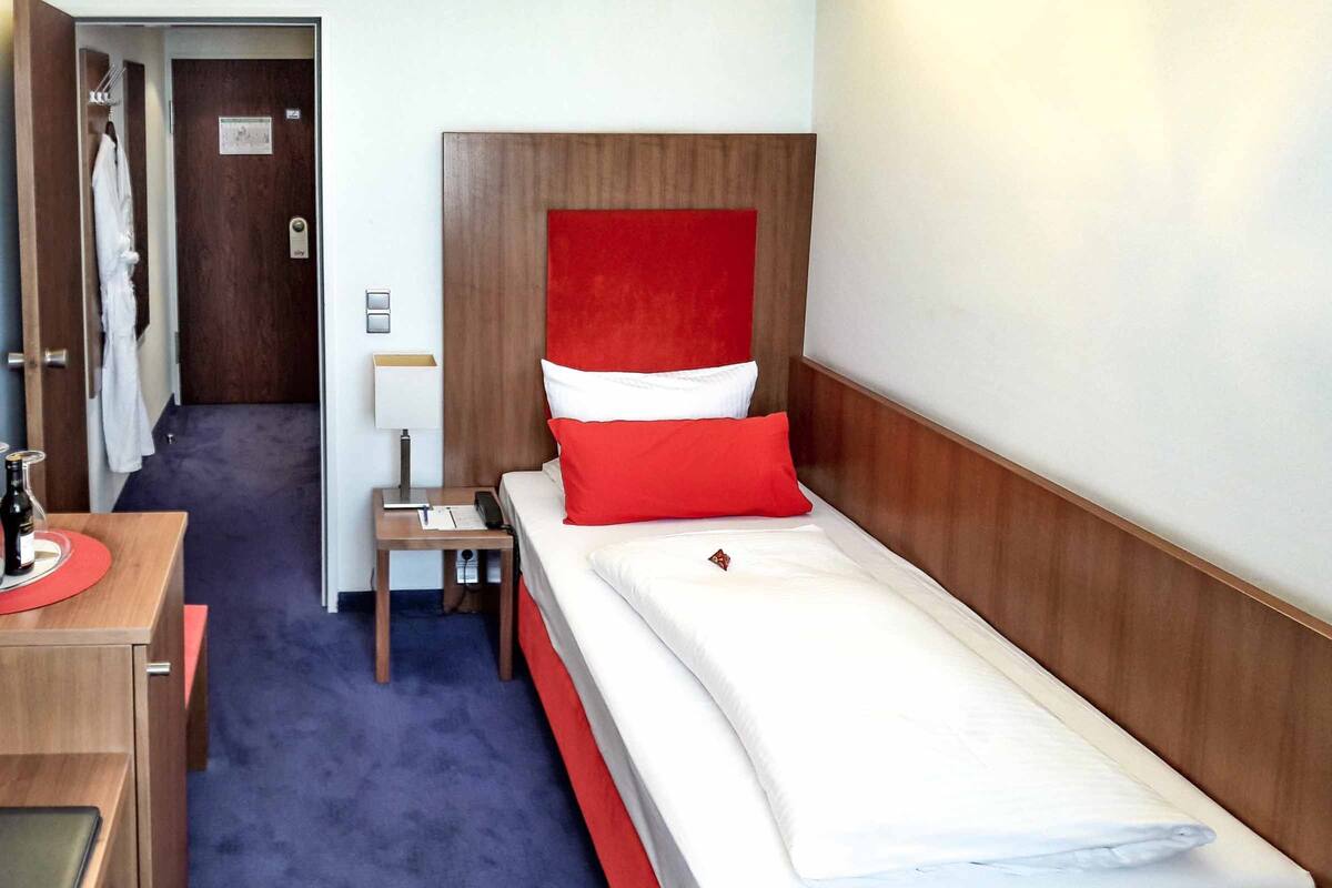 Habitación individual Confort (Aircondition) | 1 dormitorio, ropa de cama hipoalergénica, minibar y caja fuerte