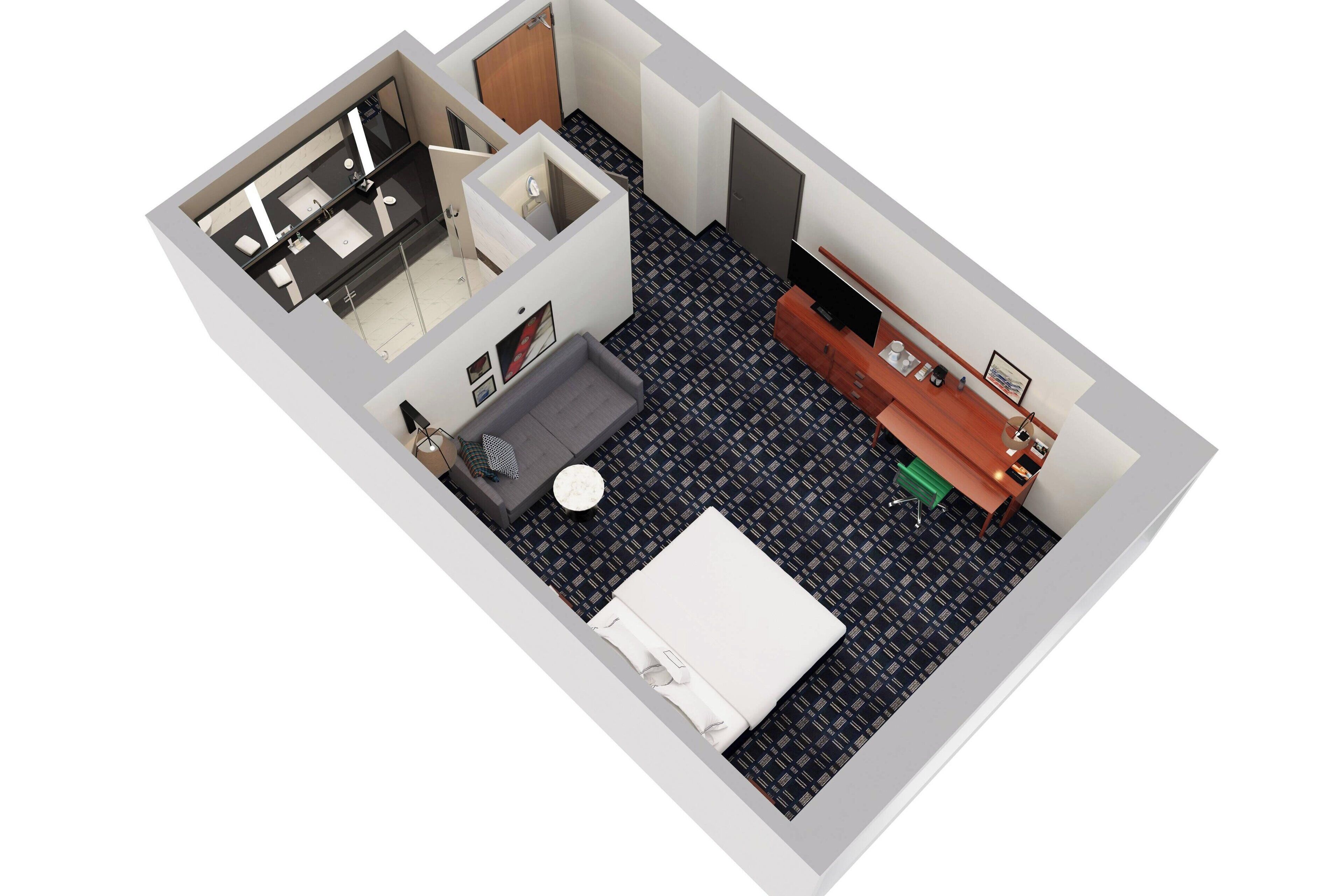 A 3D floor plan of a hotel room with a bathroom, a living area with a sofa and TV, and a small dining table.