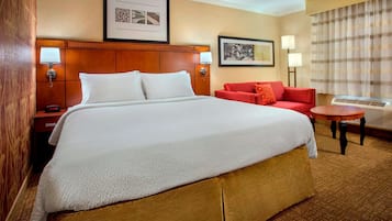 Premium bedding, desk, laptop workspace, iron/ironing board