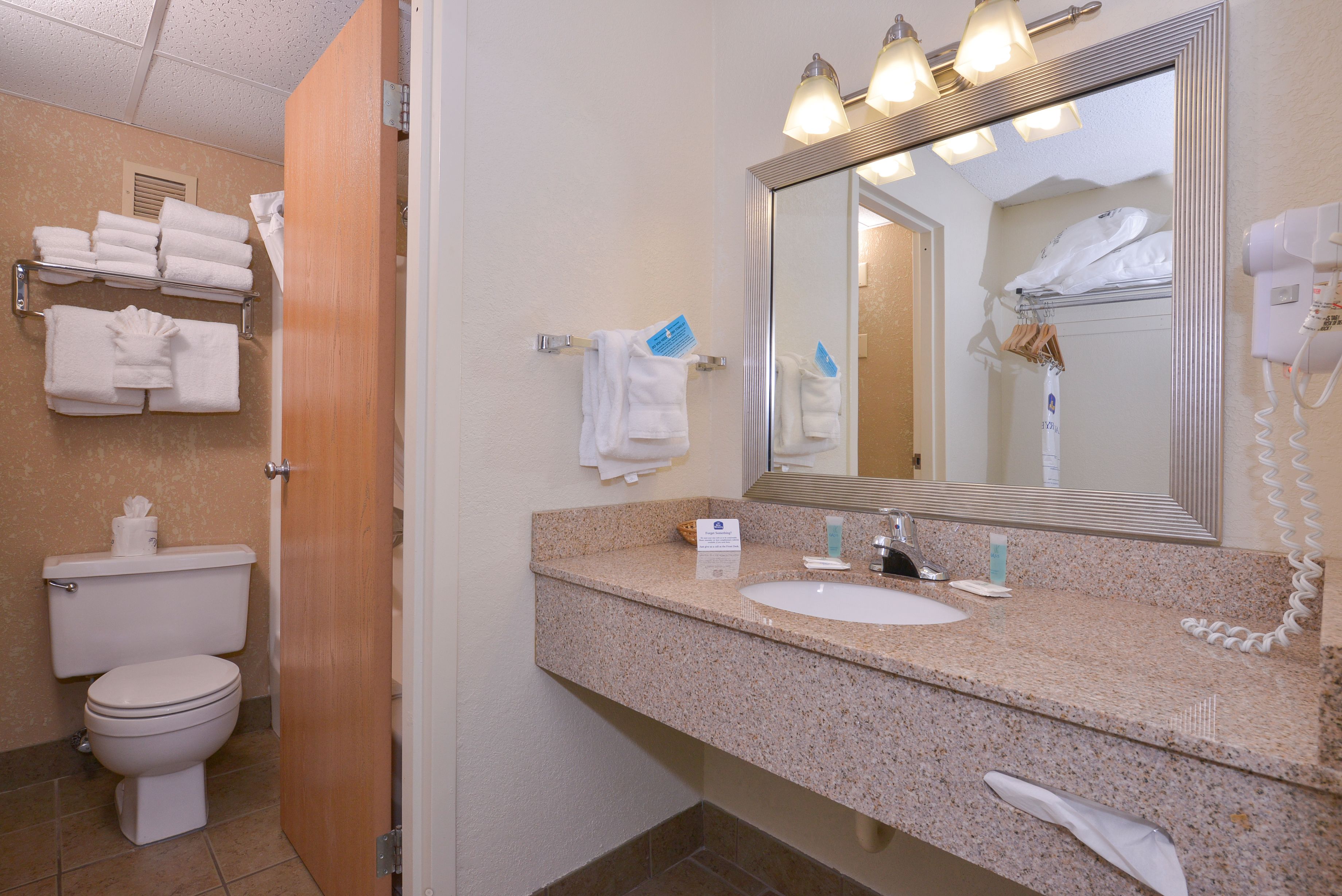 family suite, 2 queen beds, non smoking, refrigerator & microwave (with sofabed) | bathroom | combined shower/bathtub, free toiletries, hair dryer, towels