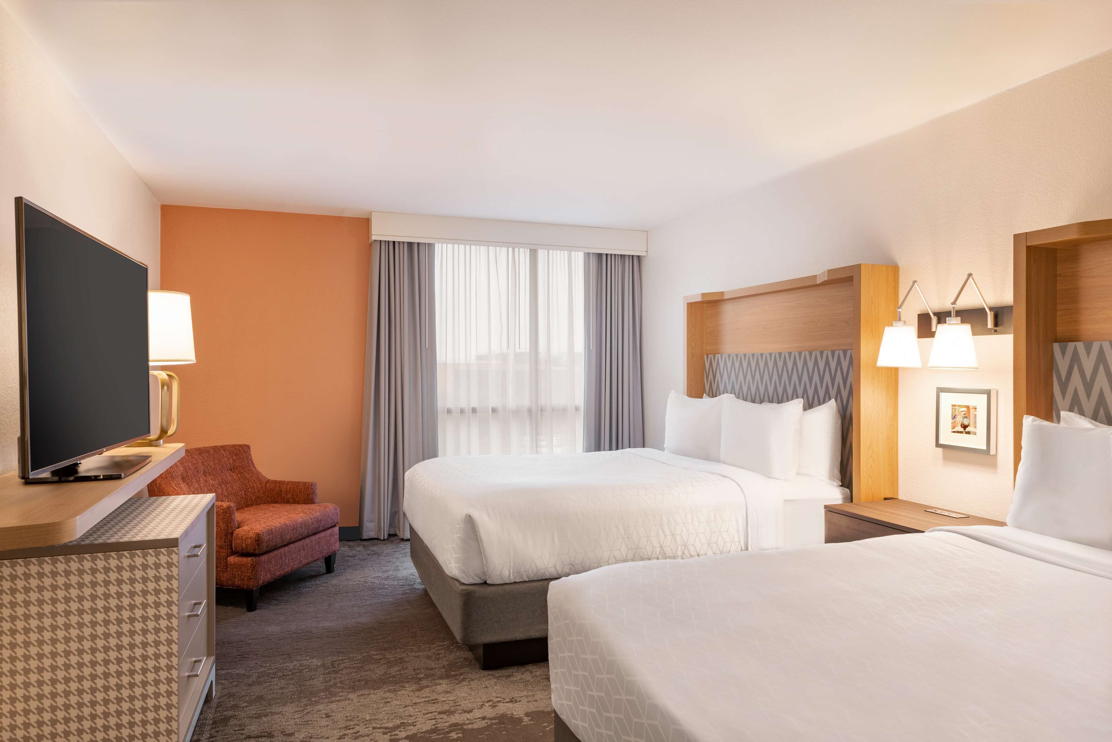 suite, 2 queen beds | premium bedding, down duvets, desk, laptop workspace