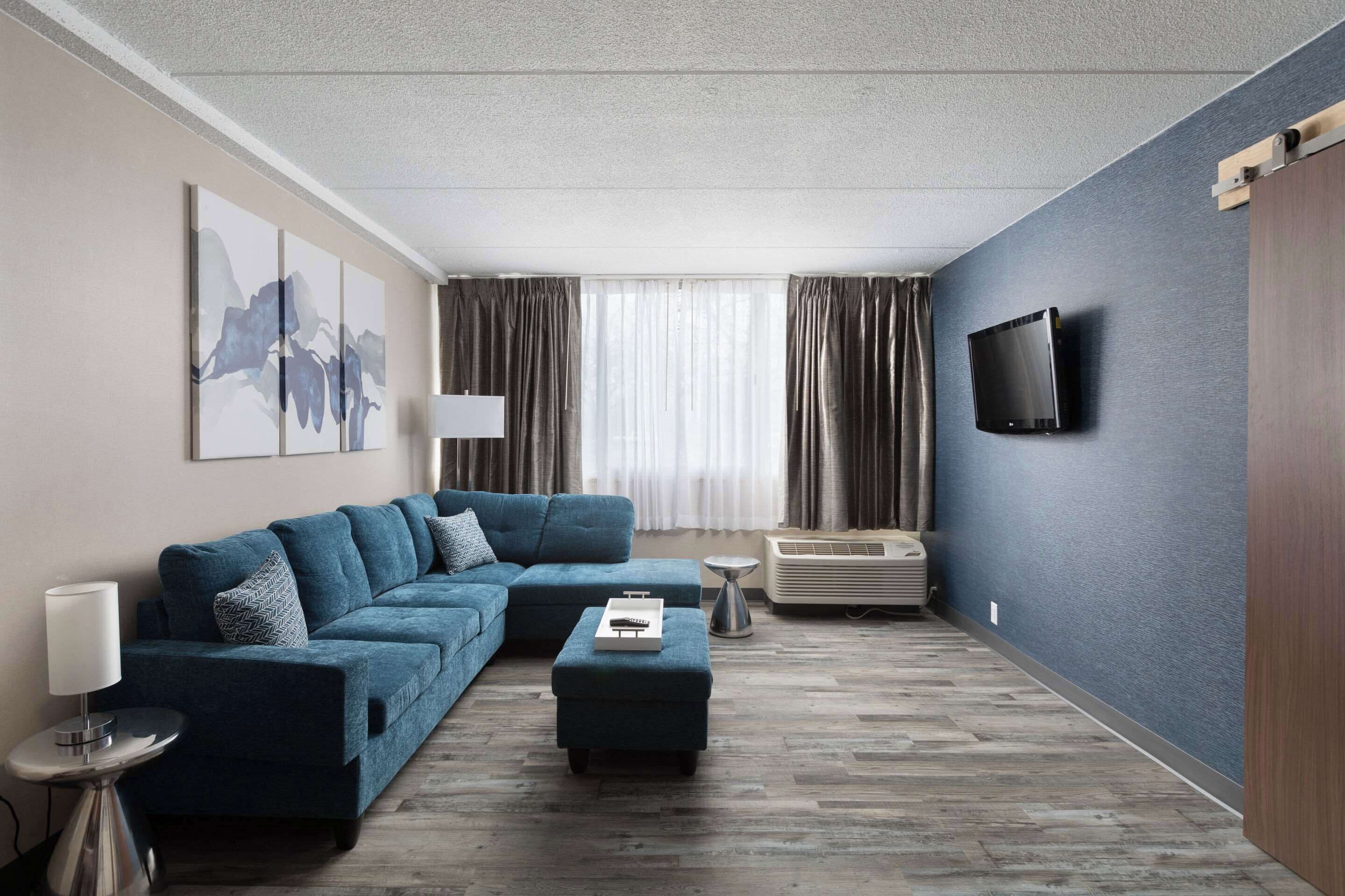 Desk, blackout curtains, iron/ironing board, free cots/infant beds