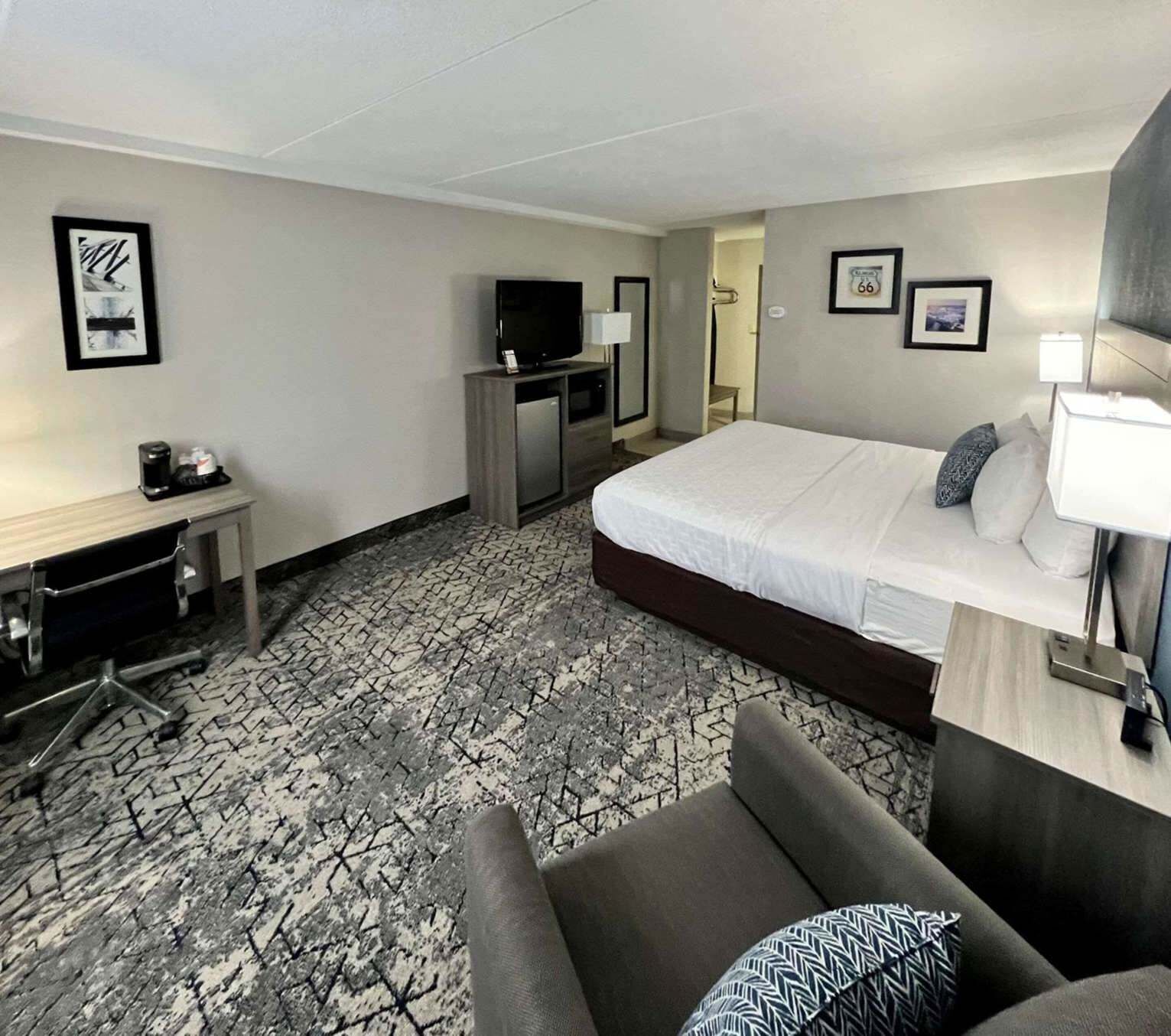 Desk, blackout drapes, iron/ironing board, free cribs/infant beds