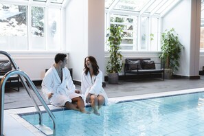 Indoor pool, open 7:00 AM to 9:30 PM, pool loungers