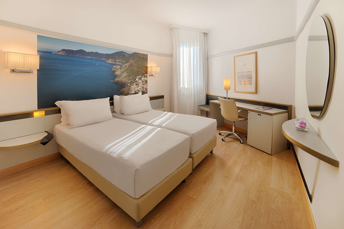 Down duvets, minibar, in-room safe, desk