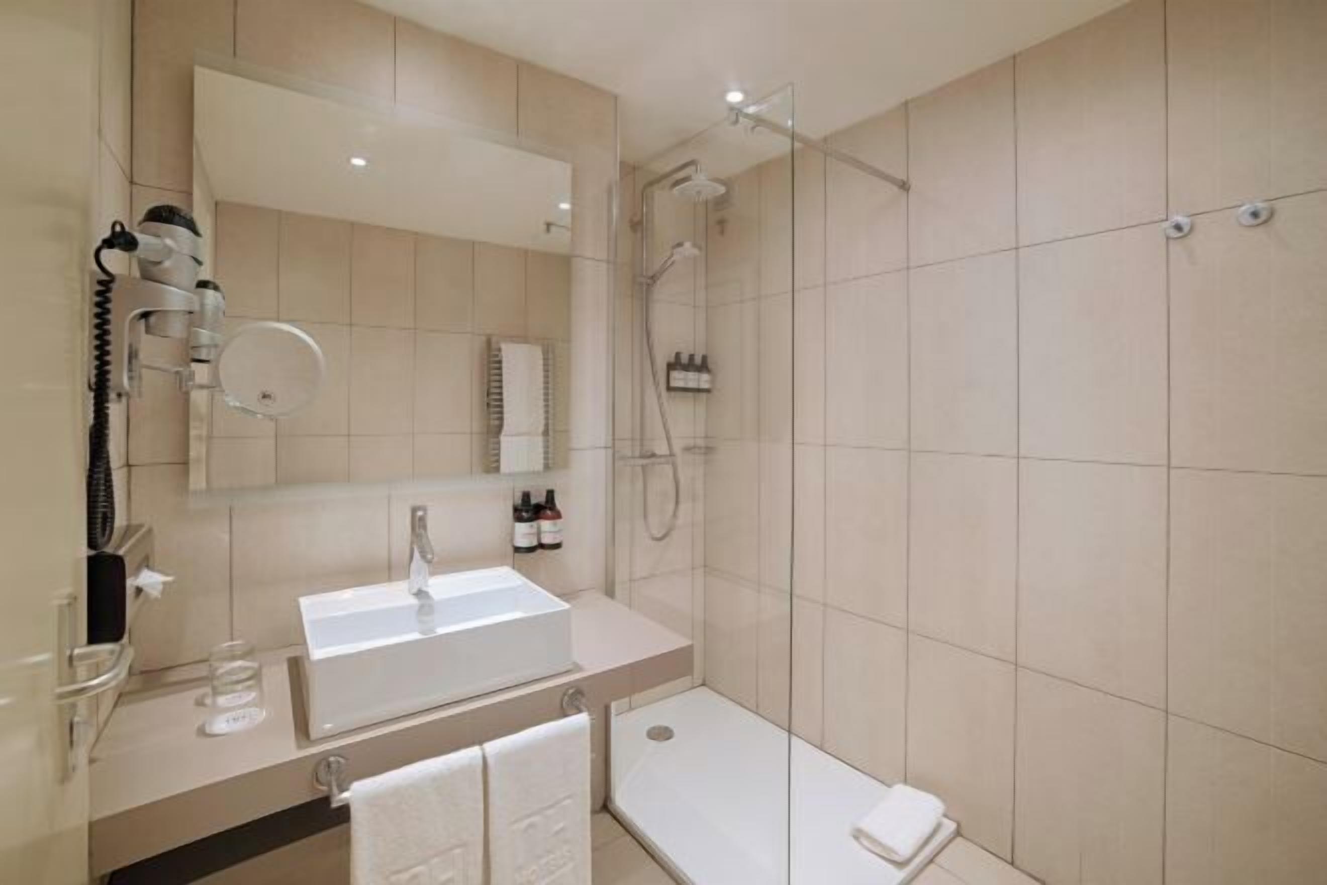 Bathroom | Eco-friendly toiletries, hair dryer, bidet, towels