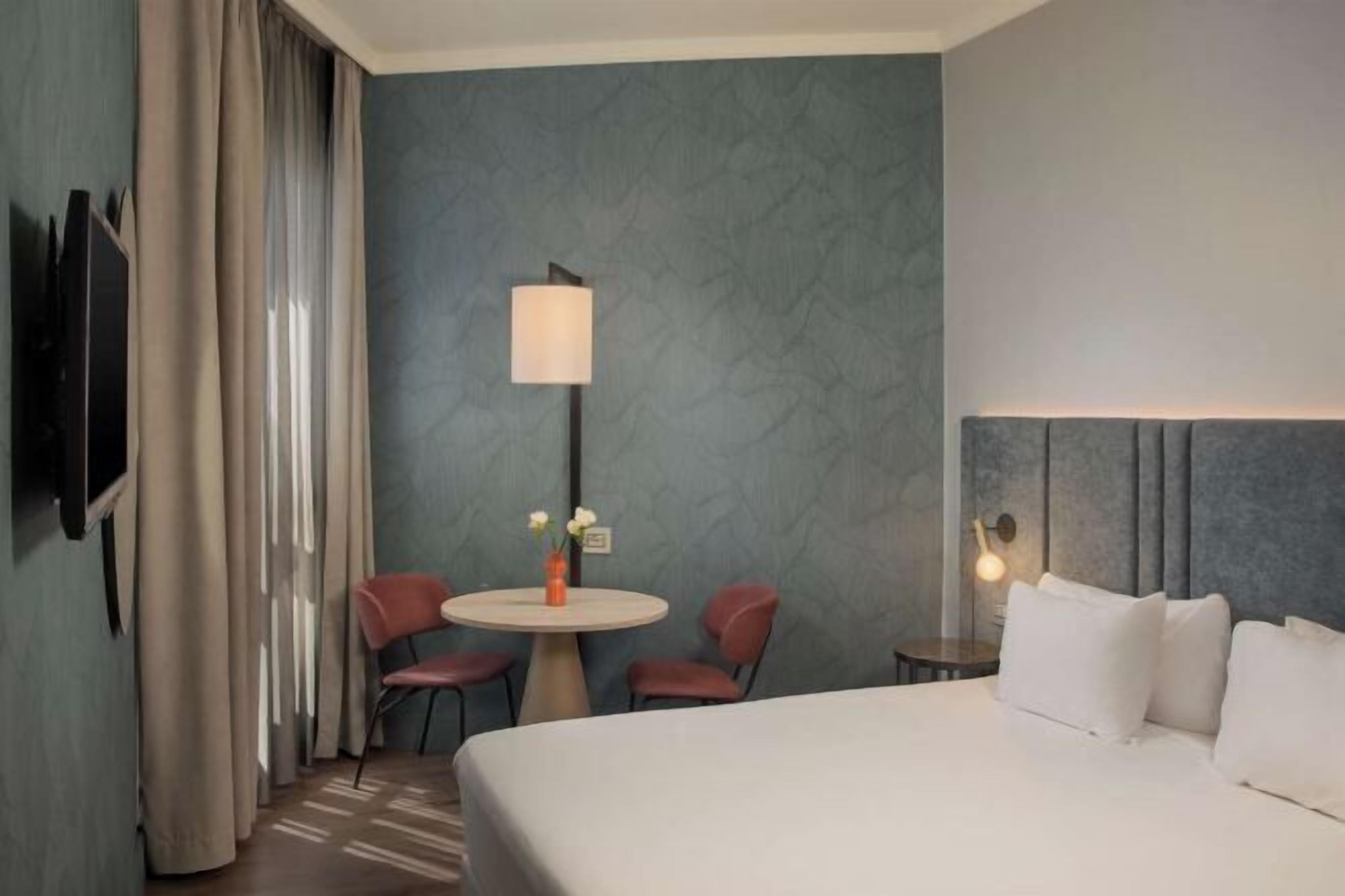 Down duvets, minibar, in-room safe, desk