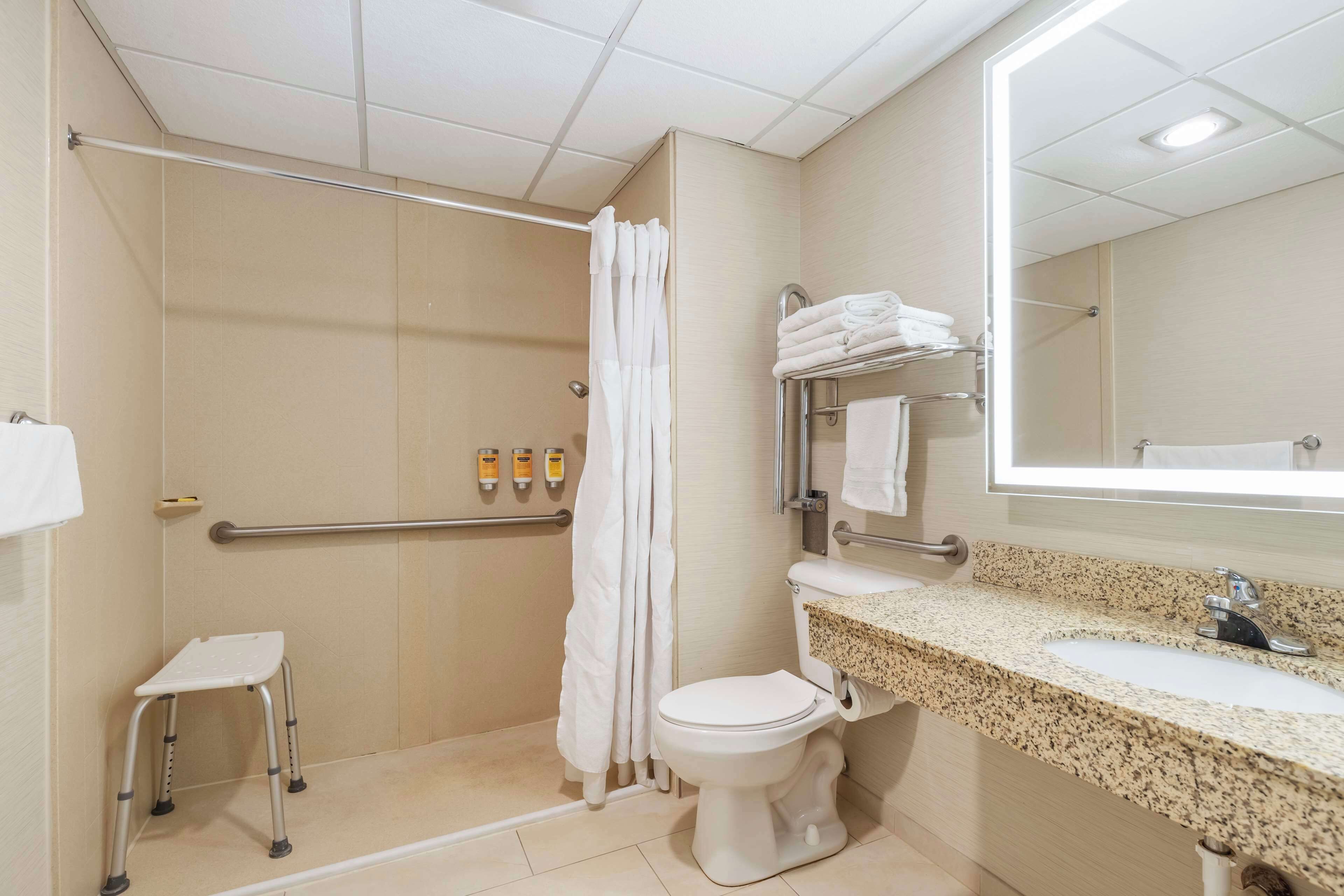 standard room, 2 queen beds, accessible, non smoking | bathroom | combined shower/bathtub, free toiletries, hair dryer, towels