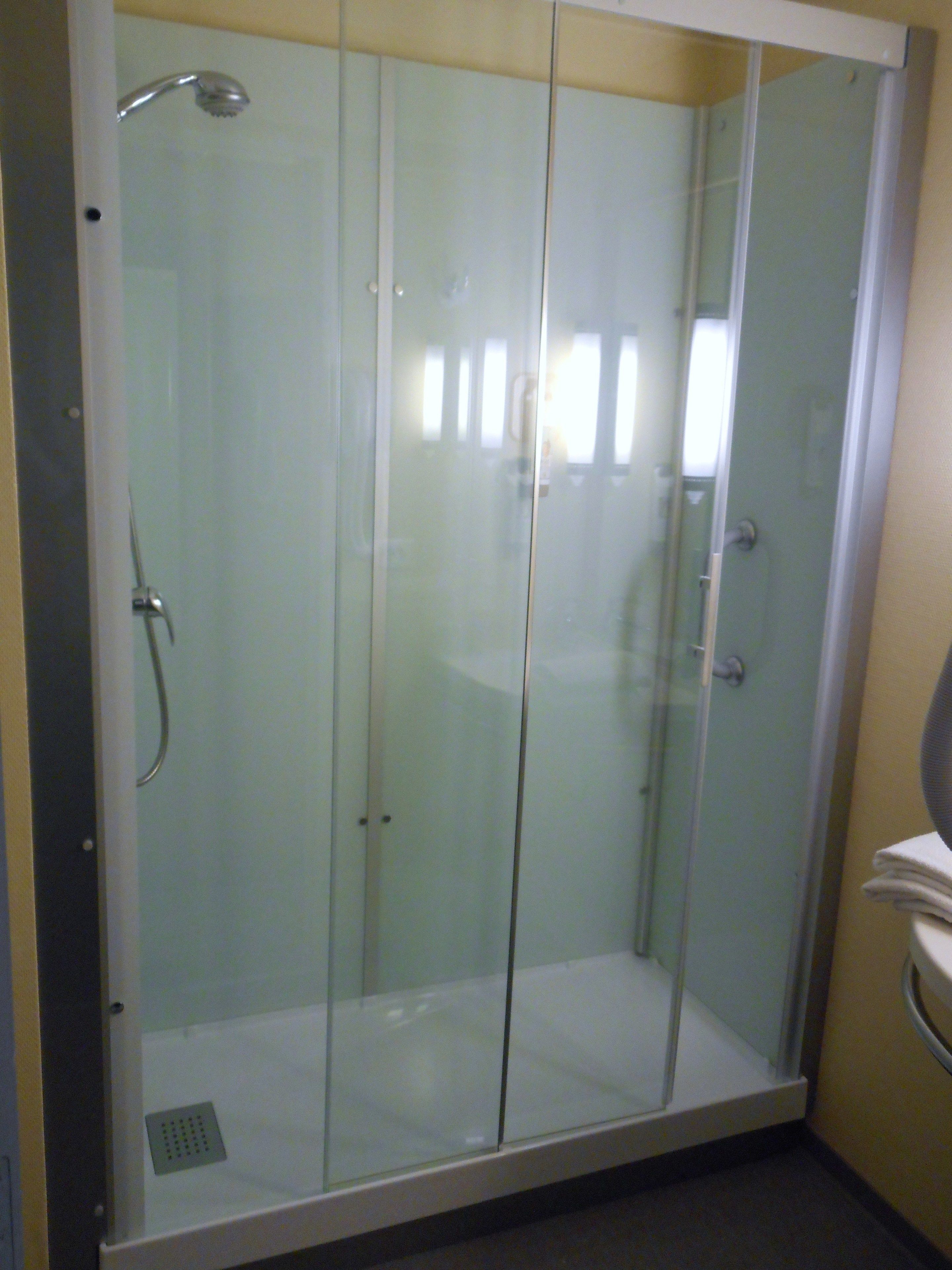 eco-friendly toiletries, hair dryer, towels