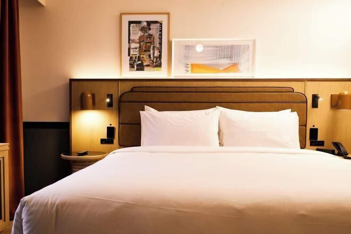 Premium bedding, Tempur-Pedic beds, desk, laptop workspace