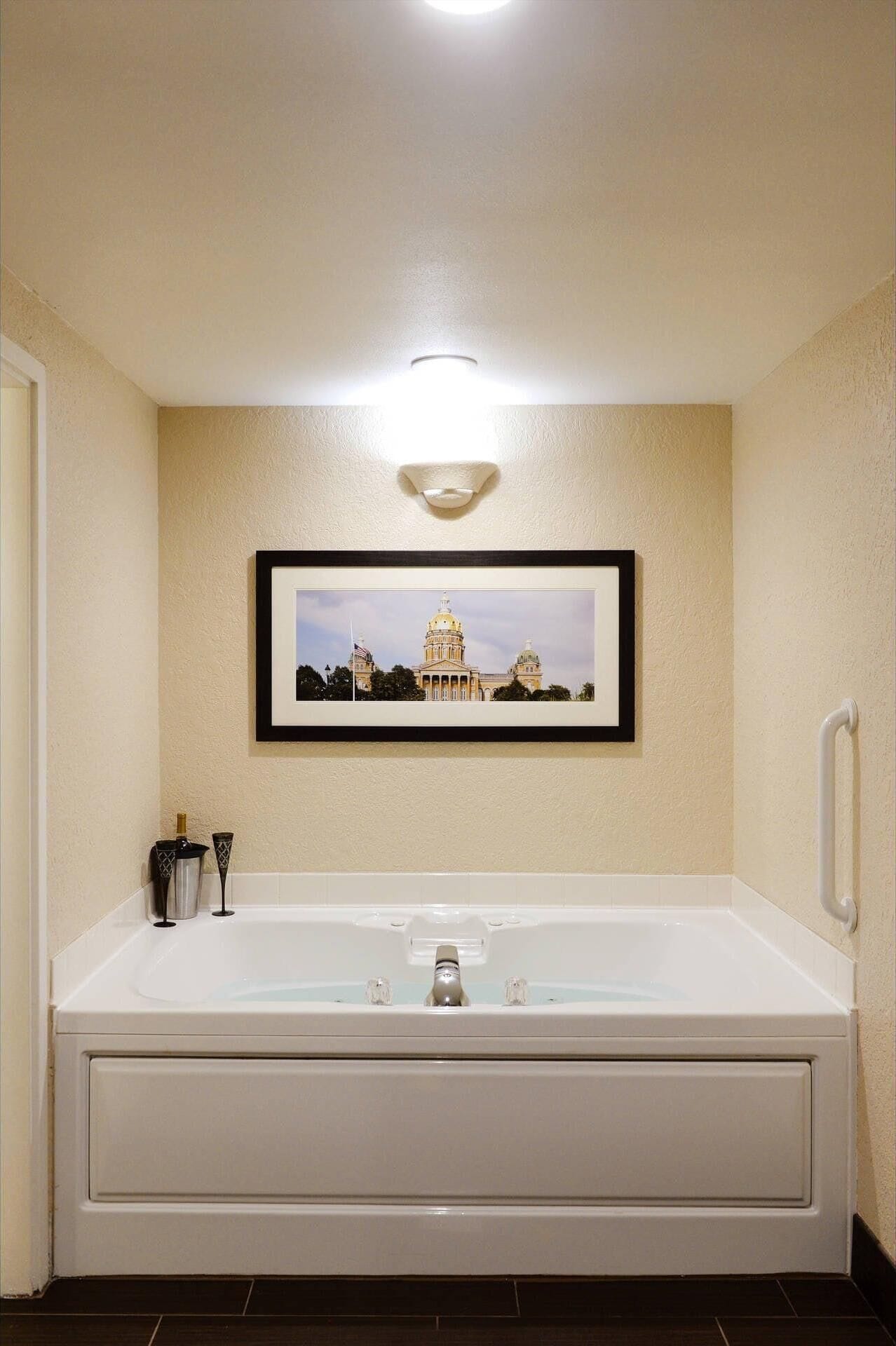 suite, 1 king bed with sofa bed, jetted tub, river view | in-room safe, desk, blackout curtains, iron/ironing board