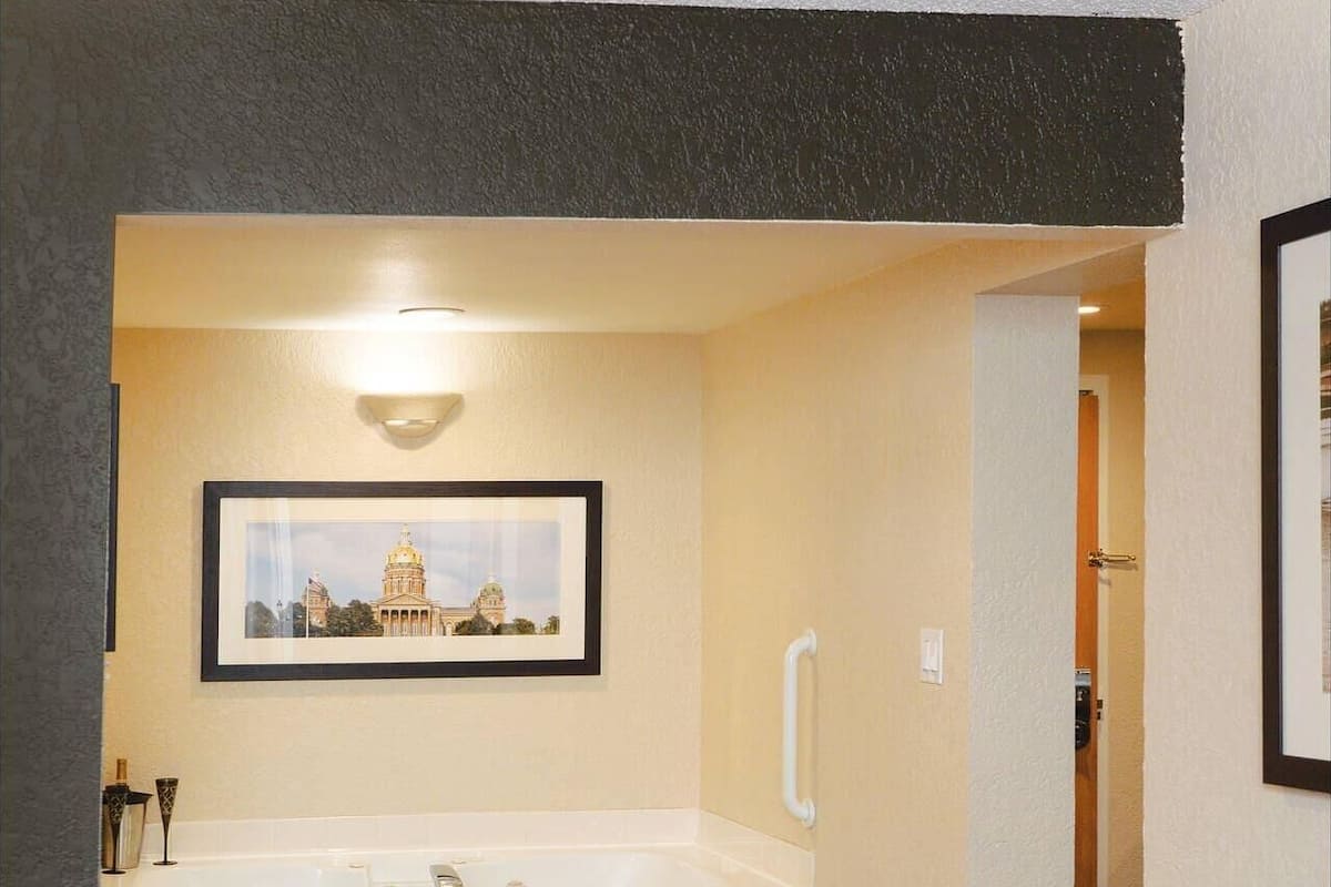 Suite, 1 King Bed with Sofa bed, Jetted Tub, River View | In-room safe, desk, blackout drapes, iron/ironing board
