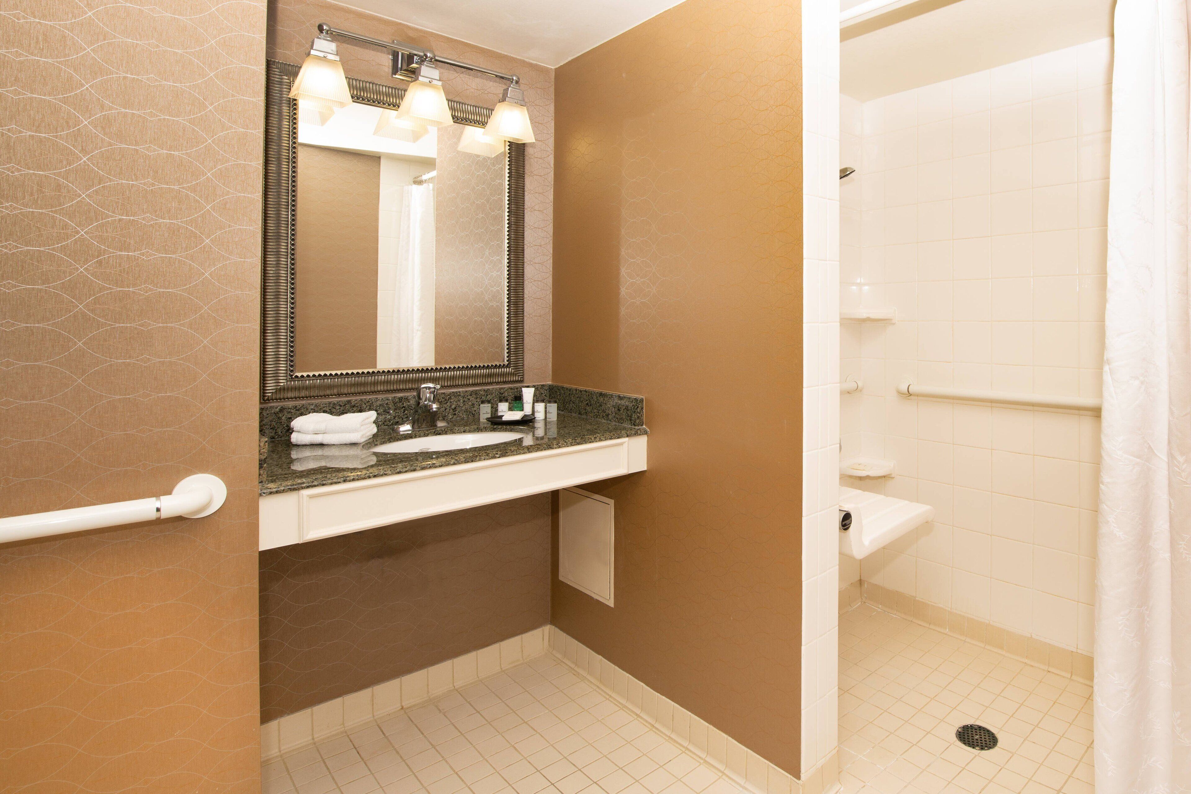 eco-friendly toiletries, hair dryer, towels, soap