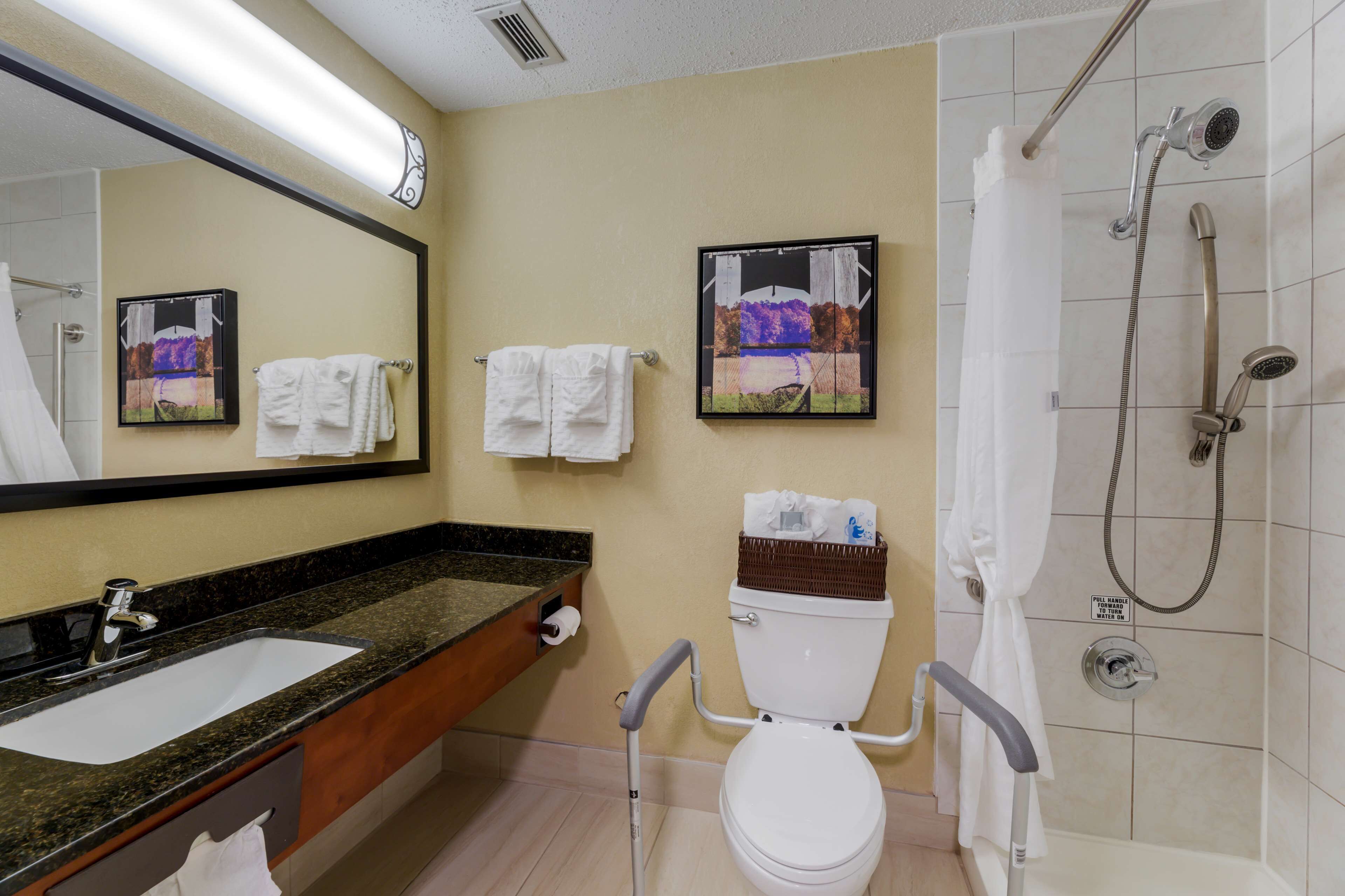 standard room, 2 double beds, accessible, refrigerator & microwave (walk-in shower) | bathroom | combined shower/bathtub, eco-friendly toiletries, hair dryer, towels