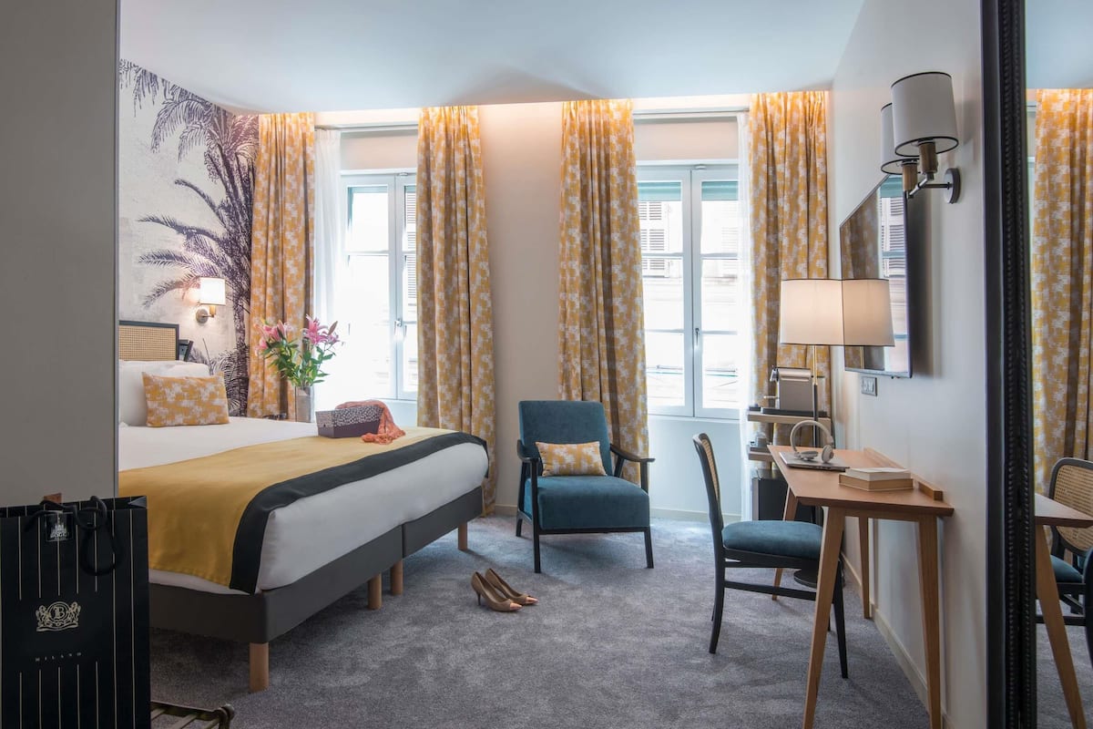 Privilege, Kamer | Luxe beddengoed, een kluis op de kamer, een bureau