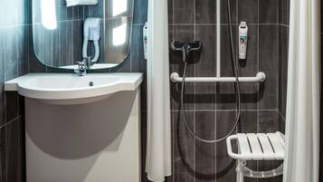 Eco-friendly toiletries, hair dryer, towels, soap