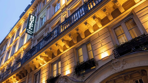 A hotel facade with ornate architectural details, including balconies with wrought iron railings and decorative moldings. - Hôtel Horset Opéra, BW Premier Collection (Paris)