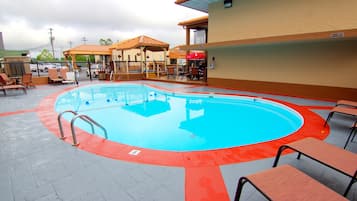 Indoor pool, outdoor pool, open 8 AM to midnight, sun loungers