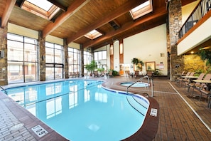 Indoor pool, outdoor pool, open 8 AM to midnight, pool loungers