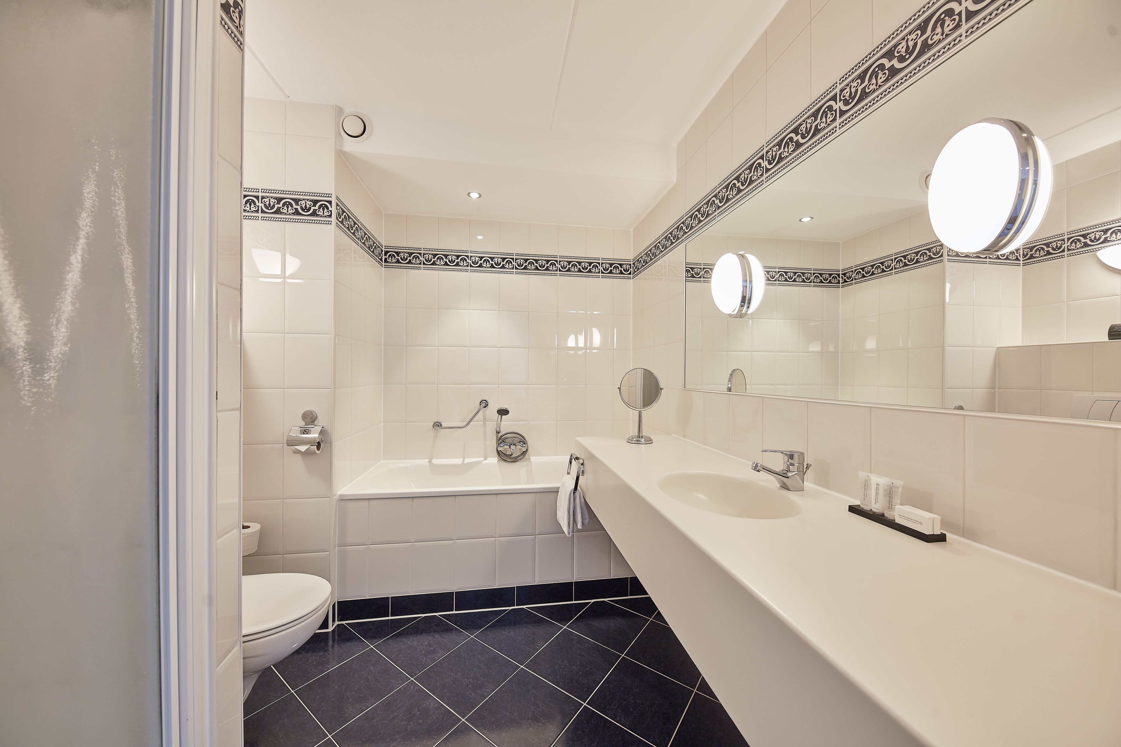 the deluxe one with a view | bathroom | free toiletries, hair dryer, towels, soap