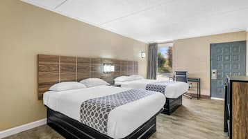 Down comforters, desk, blackout drapes, iron/ironing board