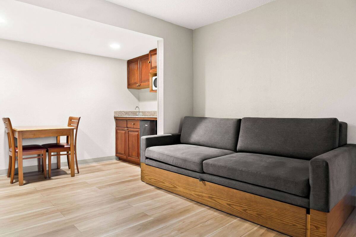 Suite, 1 King Bed, Non Smoking (One-Bedroom) | Premium bedding, desk, laptop workspace, cribs (free)
