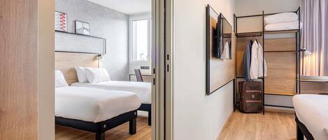 Literie de qualité supérieure, coffres-forts dans les chambres, bureau