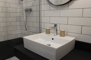 Eco-friendly toiletries, hair dryer, towels