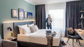 Hypo-allergenic bedding, desk, blackout drapes, soundproofing