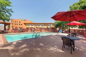 Outdoor pool, open 8:00 AM to 10:00 PM, pool umbrellas, sun loungers