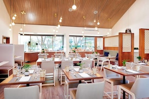 Outdoor pool, open 6 AM to 10:00 PM, pool umbrellas, sun loungers