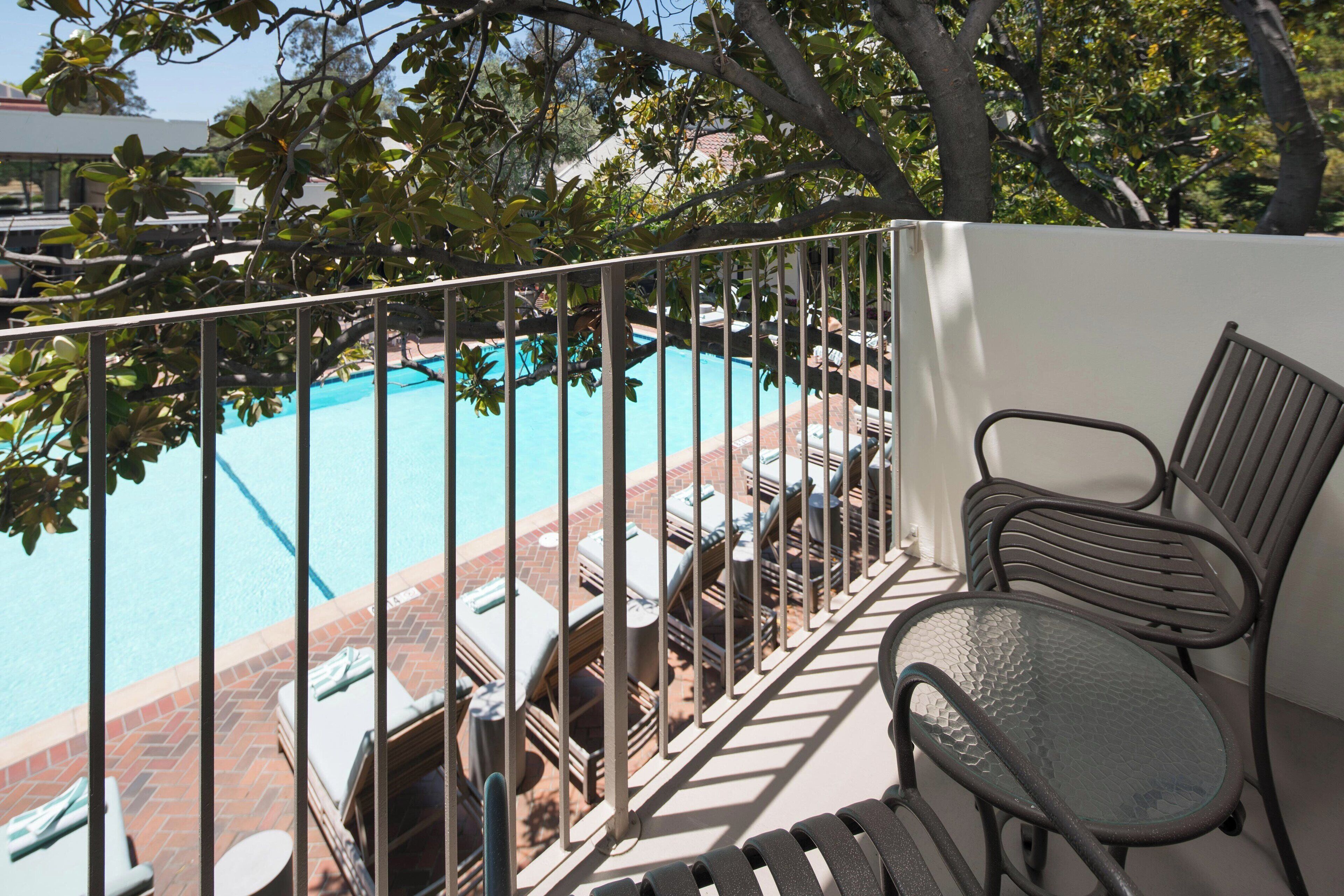 outdoor pool, open 6 am to 10:00 pm, pool umbrellas, pool loungers