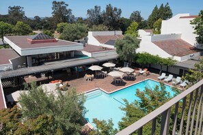 Outdoor pool, open 6 AM to 10:00 PM, pool umbrellas, sun loungers