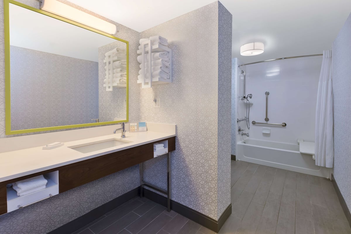 room, 2 double beds, accessible, bathtub | bathroom | eco-friendly toiletries, hair dryer, towels