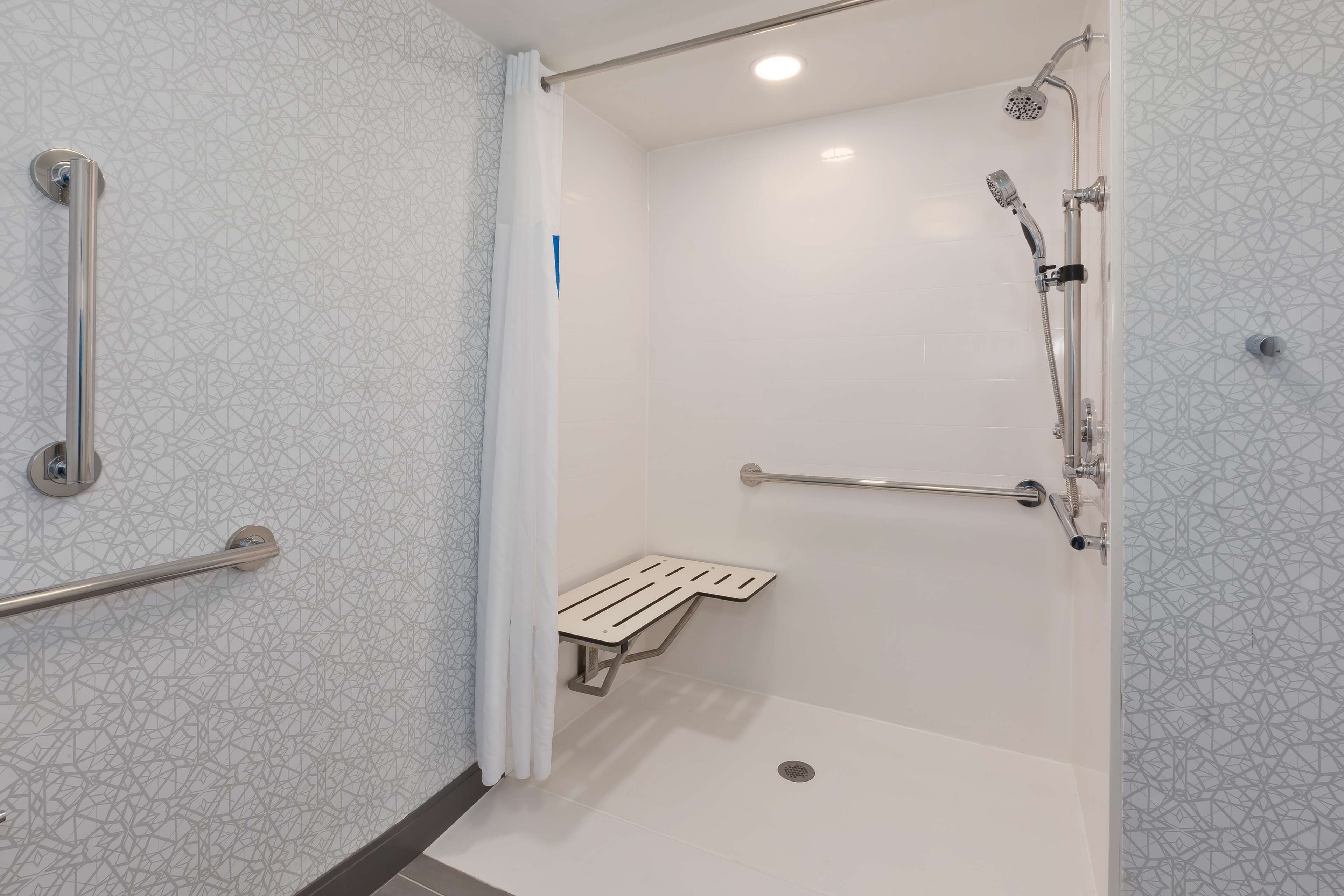 room, 1 king bed, accessible | bathroom | eco-friendly toiletries, hair dryer, towels
