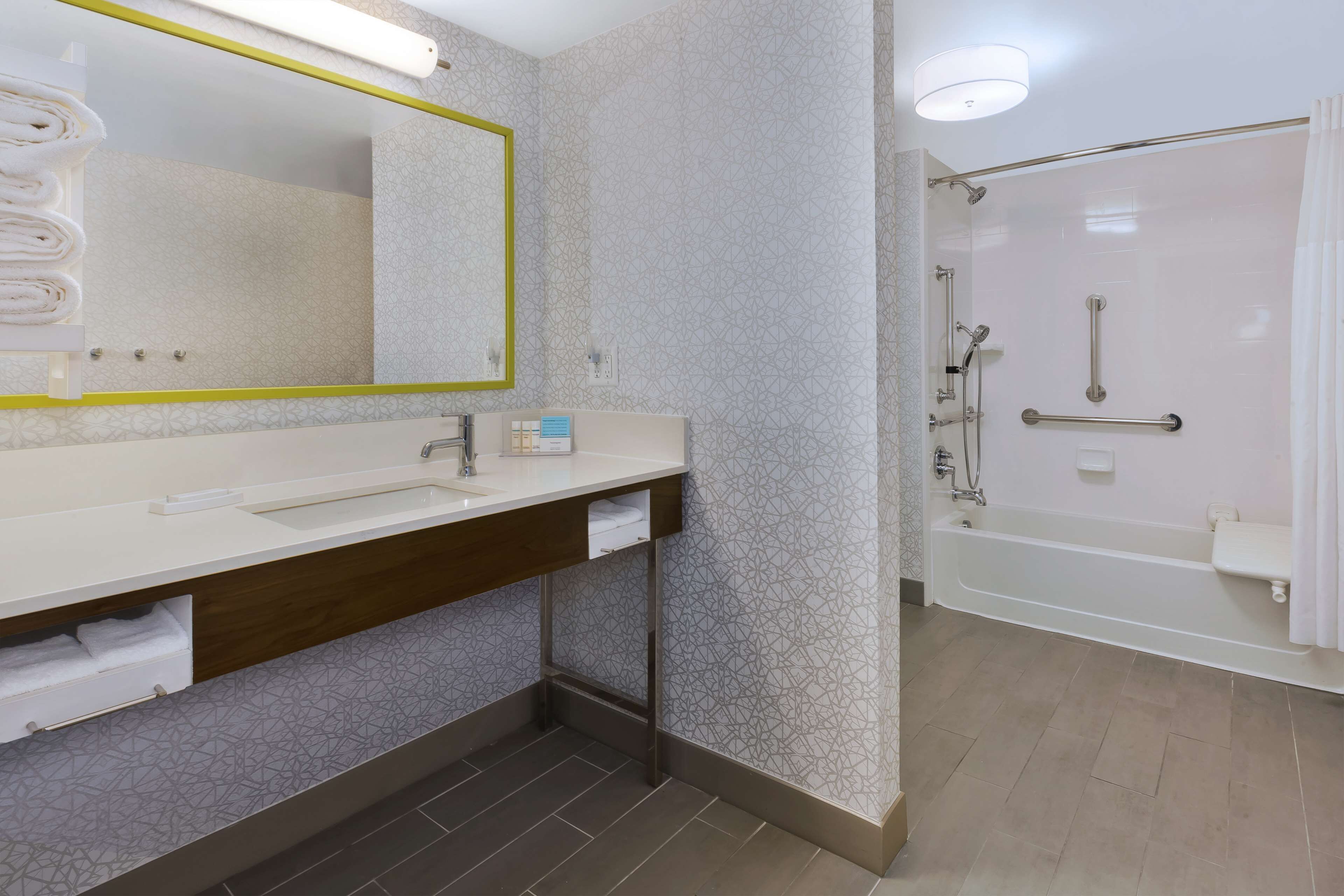 eco-friendly toiletries, hair dryer, towels