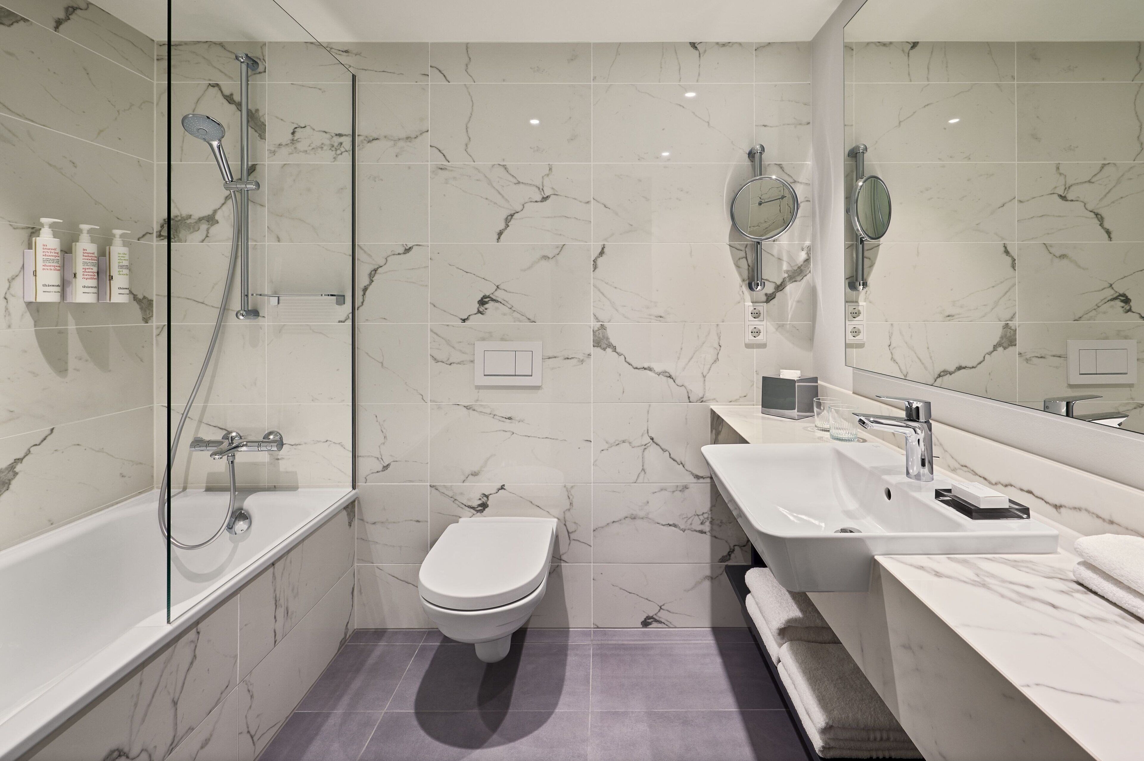 combined shower/bathtub, free toiletries, hair dryer, towels