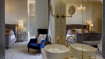 Junior Suite, 1 King Bed, Non Smoking | Bathroom | Combined shower/tub, free toiletries, hair dryer, towels