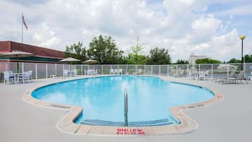 Seasonal outdoor pool, open 10:00 AM to 8:00 PM, pool loungers