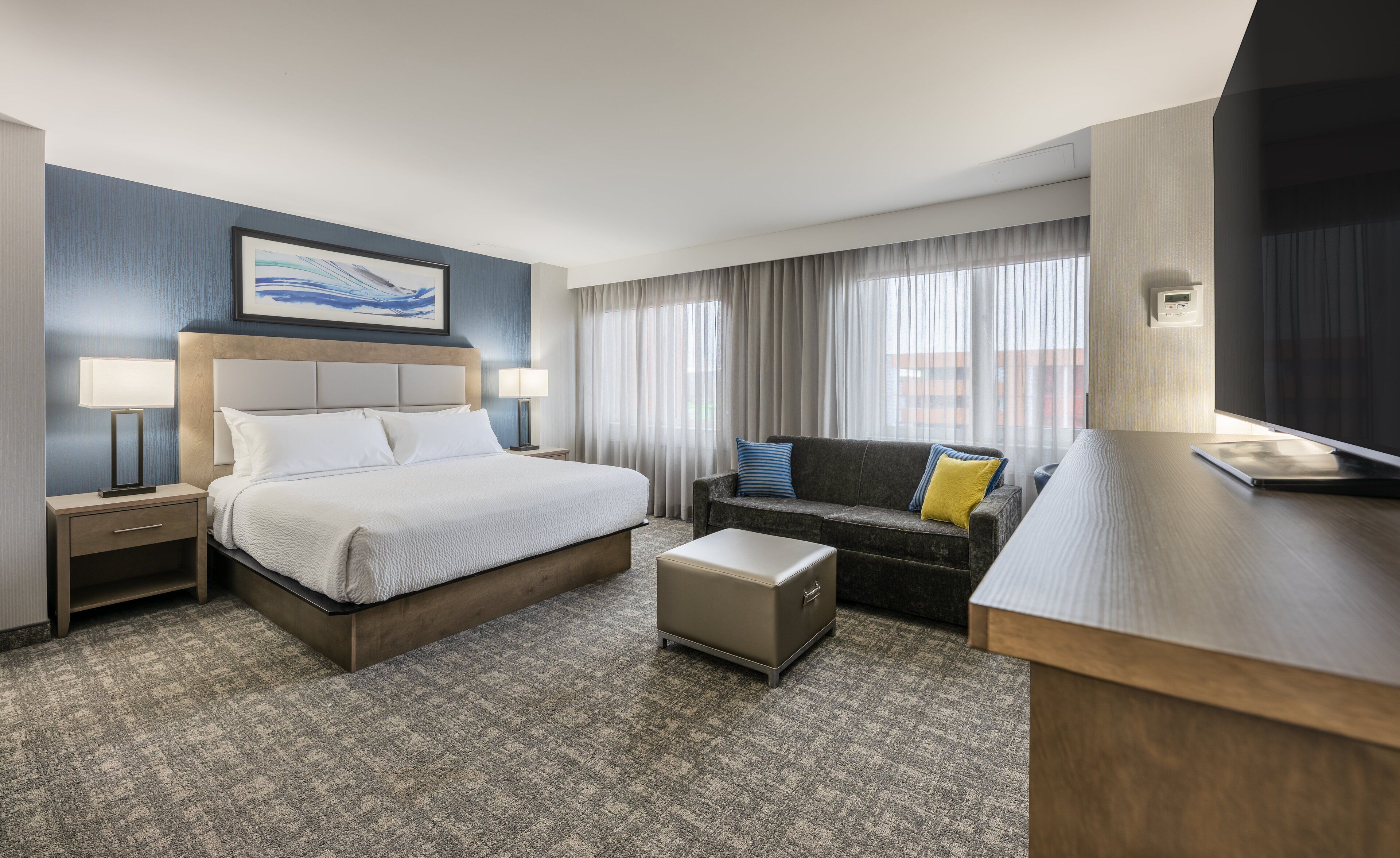 1 bedroom, premium bedding, laptop workspace, blackout curtains