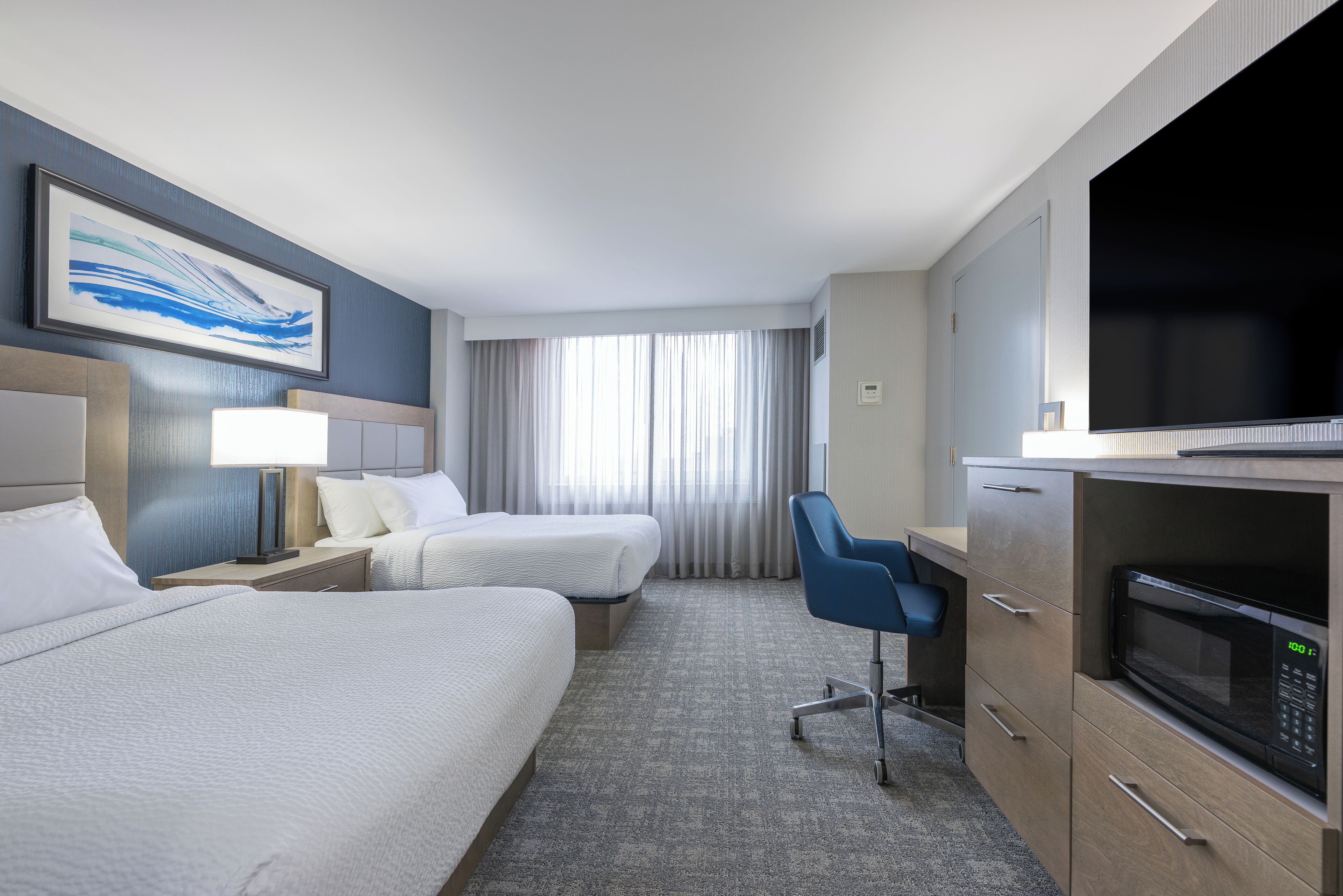 Standard Room, 2 Double Beds | 1 bedroom, premium bedding, laptop workspace, blackout curtains