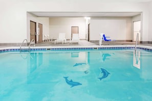 Indoor pool, open 10:00 AM to 10:00 PM, pool loungers