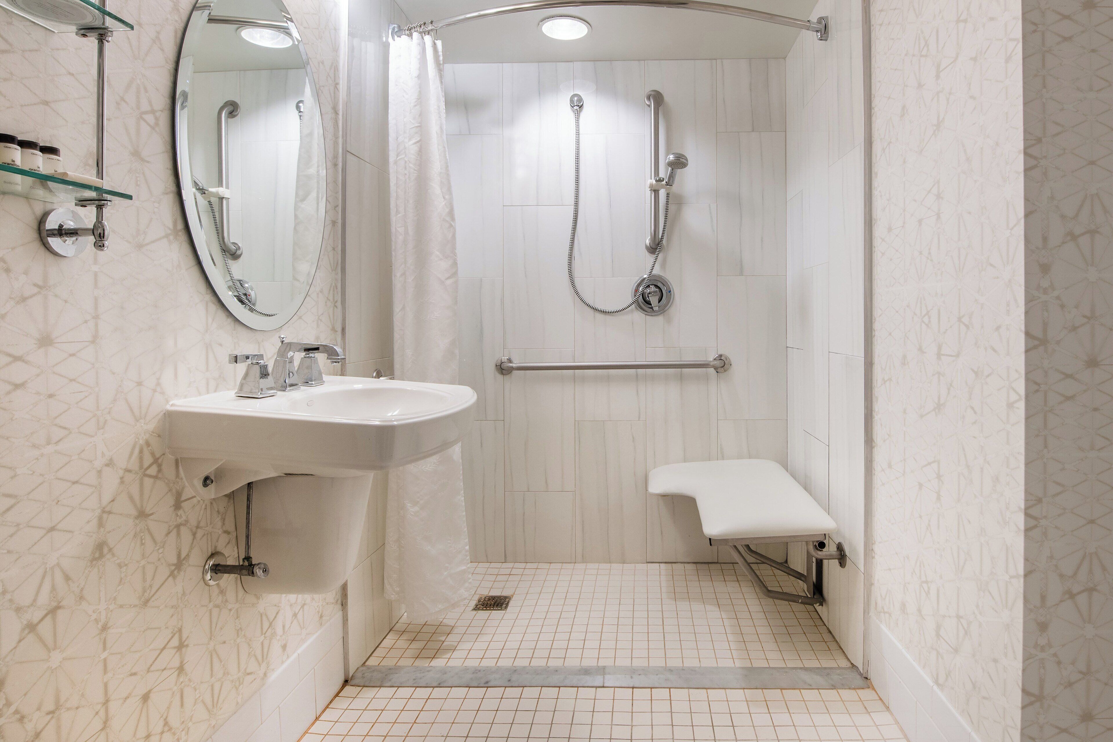 comfort suite, 1 king bed with sofa bed | bathroom | combined shower/bathtub, eco-friendly toiletries, hair dryer, bathrobes