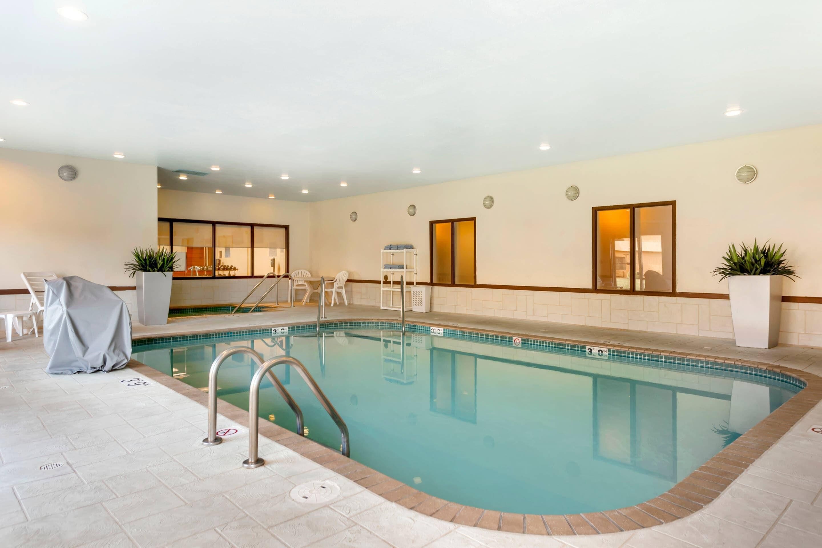 Indoor pool, open 7:00 AM to 10:00 PM, sun loungers