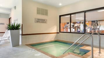 Indoor pool, open 7:00 AM to 10:00 PM, pool loungers