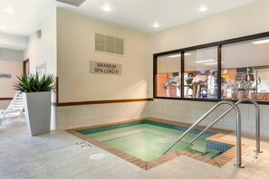 Indoor pool, open 7:00 AM to 10:00 PM, pool loungers