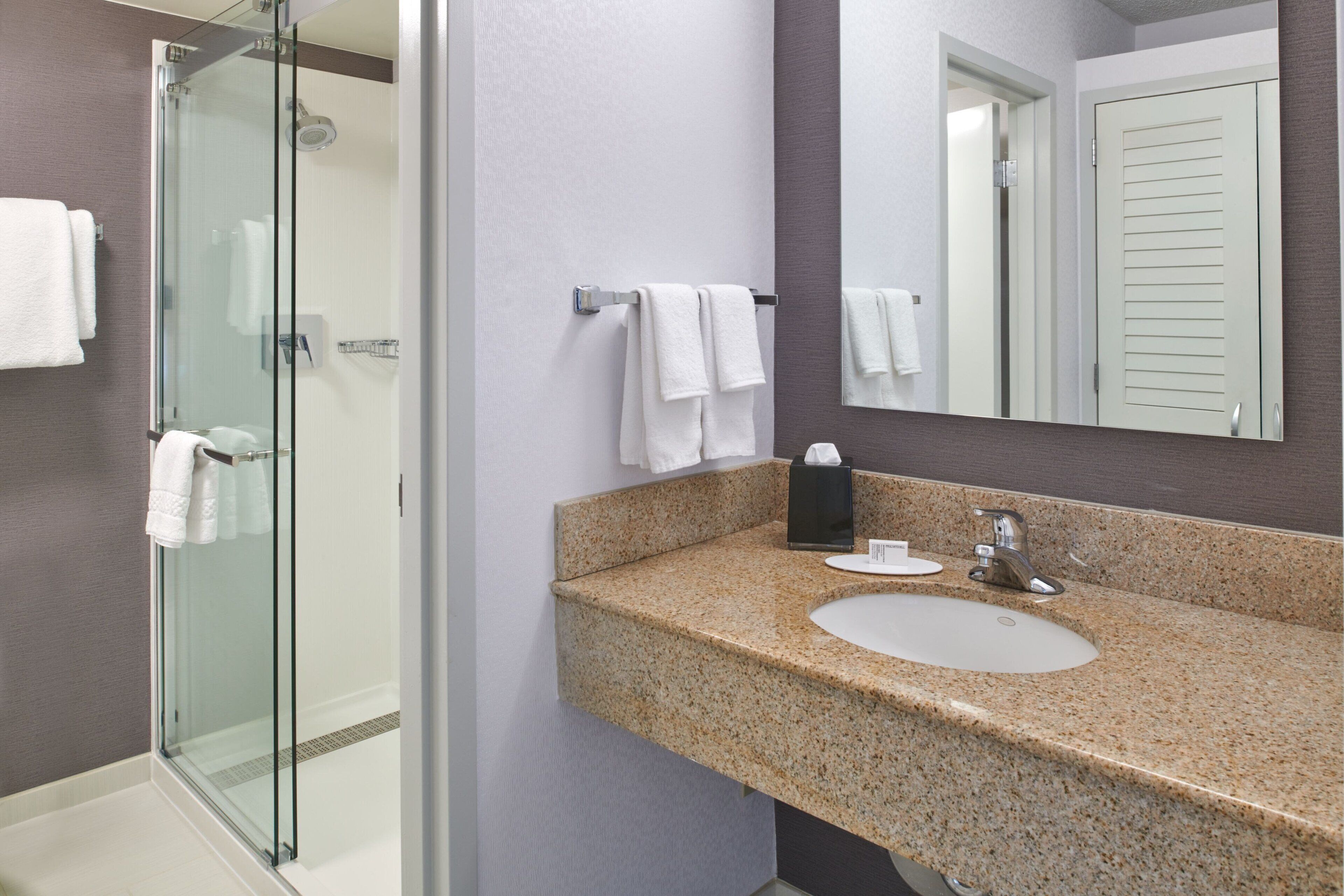 combined shower/bathtub, eco-friendly toiletries, hair dryer, towels