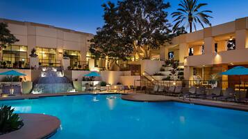 Outdoor pool, open 6:00 AM to 10:00 PM, pool cabanas (surcharge)