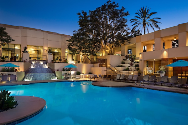 Outdoor pool, open 6:00 AM to 10:00 PM, cabanas (surcharge)