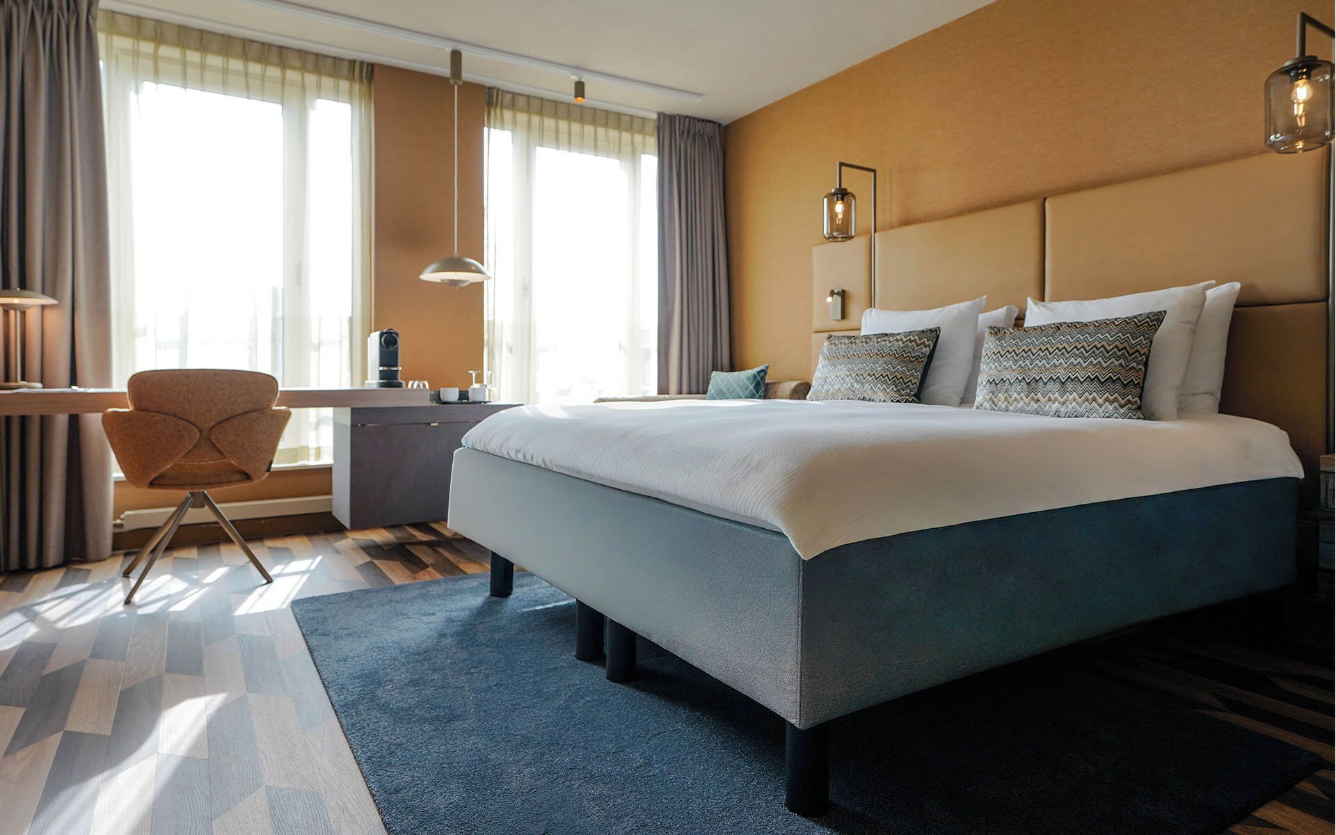 Premium bedding, down duvets, in-room safe, desk